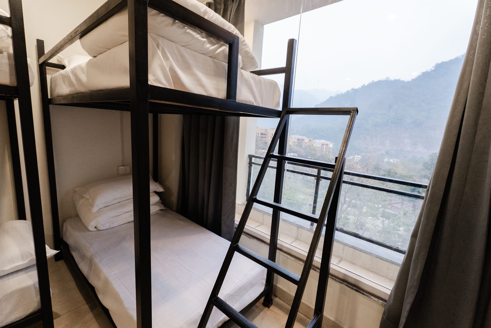 Shared Dormitory (Per Bed) — Single Bunk room with a bunk in the 6-bed mountain dorm